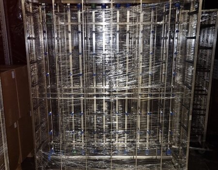 Empty Tecniplast Blueline 1284 rack for 96 cages