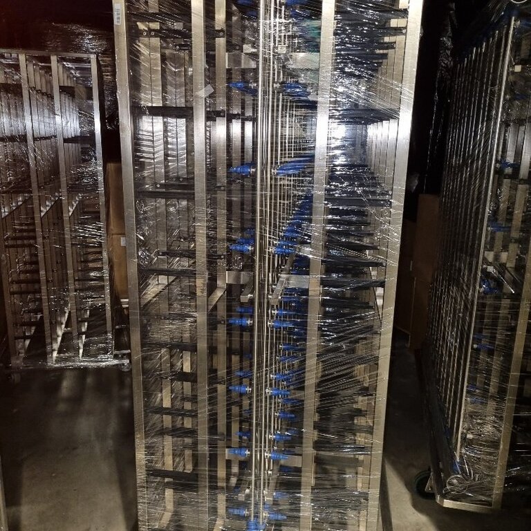Empty Tecniplast Blueline 1284 rack for 96 cages